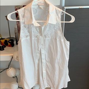 Collared, sleeves white shirt with lace top.